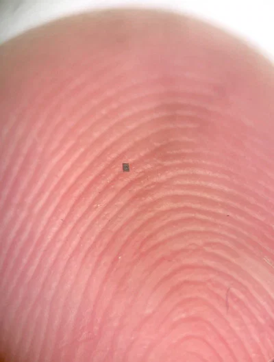 Researchers Create the World’s Smallest Fully Autonomous Robots 2 A tiny, fully integrated microrobot that fits on a fingerprint ridge